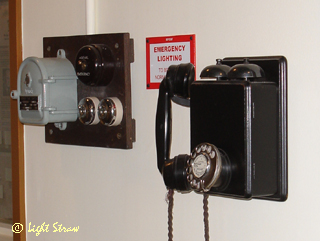 Lighting control and wall telephone